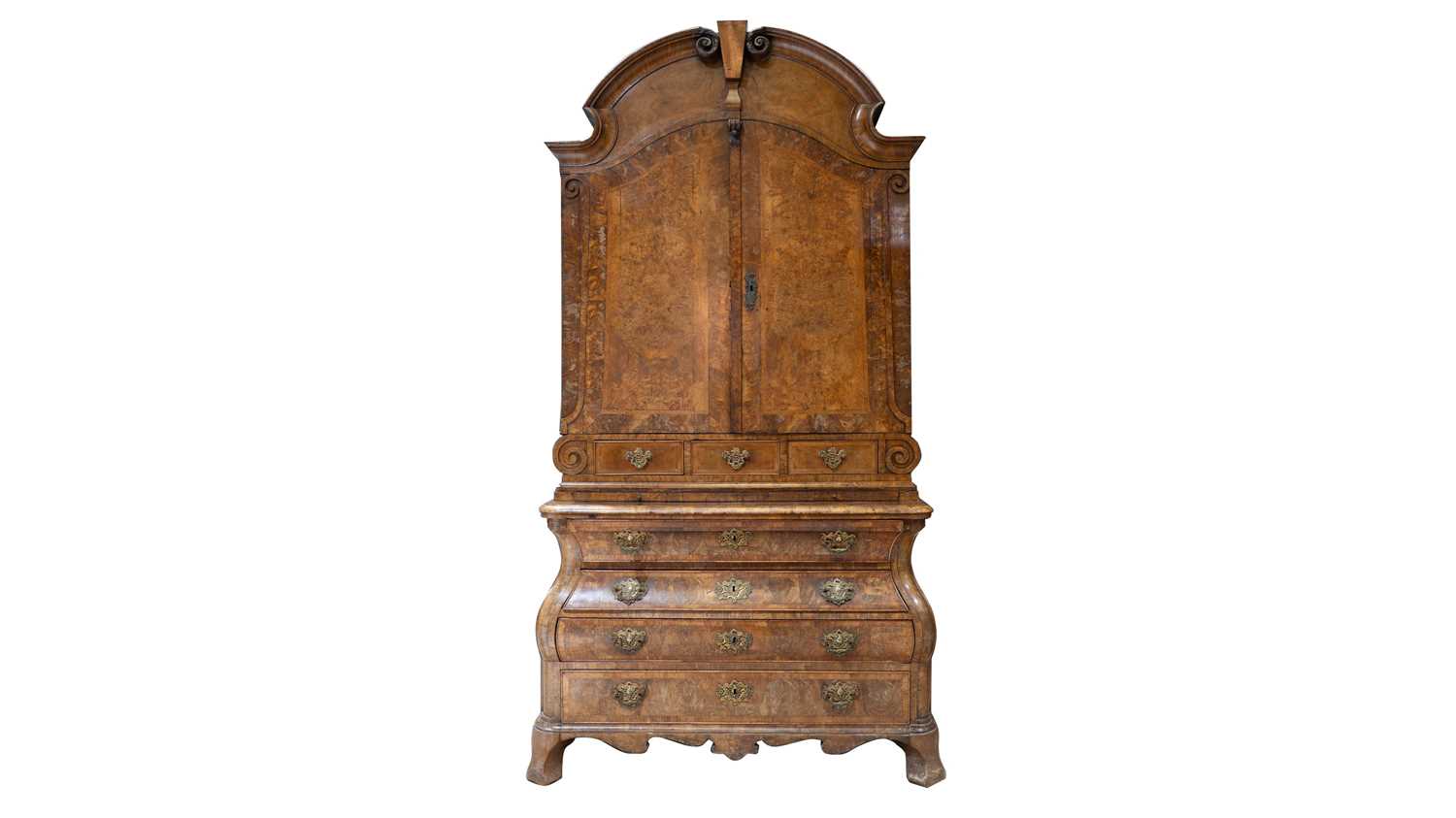 A Dutch burr walnut bombe cabinet on chest, late 18th/early 19th Century