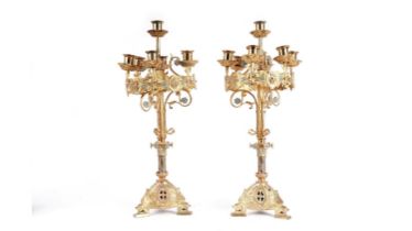 A pair of early 20th Century gilt candelabra