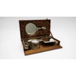 A selection of silver mounted dressing table items