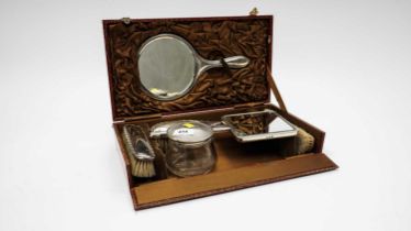 A selection of silver mounted dressing table items