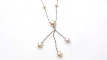 A cultured pearl and diamond drop necklace