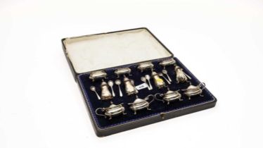 An extensive silver condiment set, by Reid & Sons