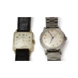 A wristwatch by Garrard and another