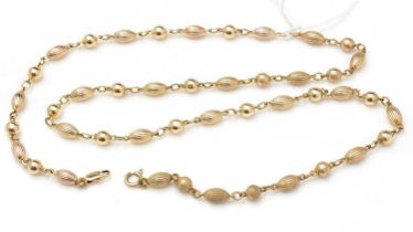 A 9ct yellow gold matching bracelet and necklace