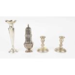 Silver caster, vase and candlesticks