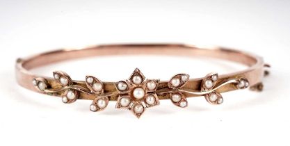 A Victorian seed pearl and 9ct gold bangle