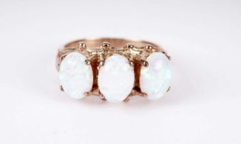 A 9ct yellow gold and synthetic opal dress ring
