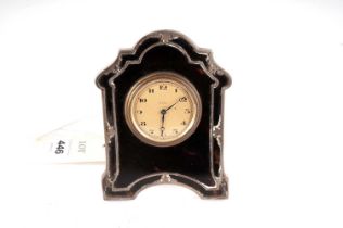 A 1920s silver and tortoiseshell desk clock