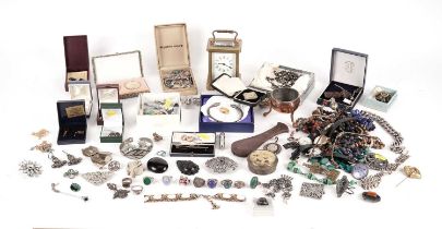 A selection of jewellery and a carriage clock