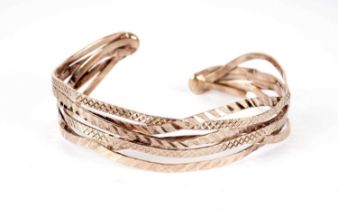 A 9ct yellow gold bangle