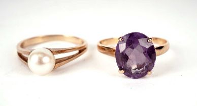 A synthetic colour change sapphire dress ring; and another