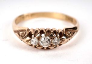 An Edwardian three stone diamond ring