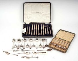 A set of silver handled knives and forks and other cutlery