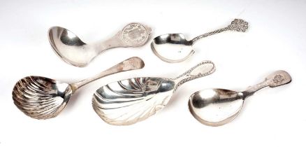 A selection of Georgian and later silver caddy spoons