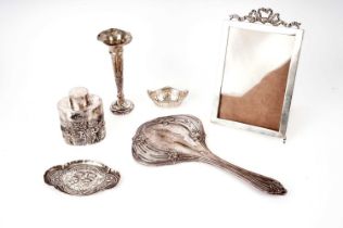 A selection of dressing table and other silver accessories
