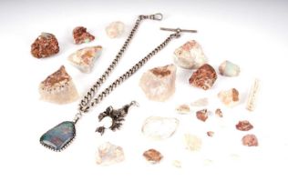 A collection of rough opal stones; and opal jewellery