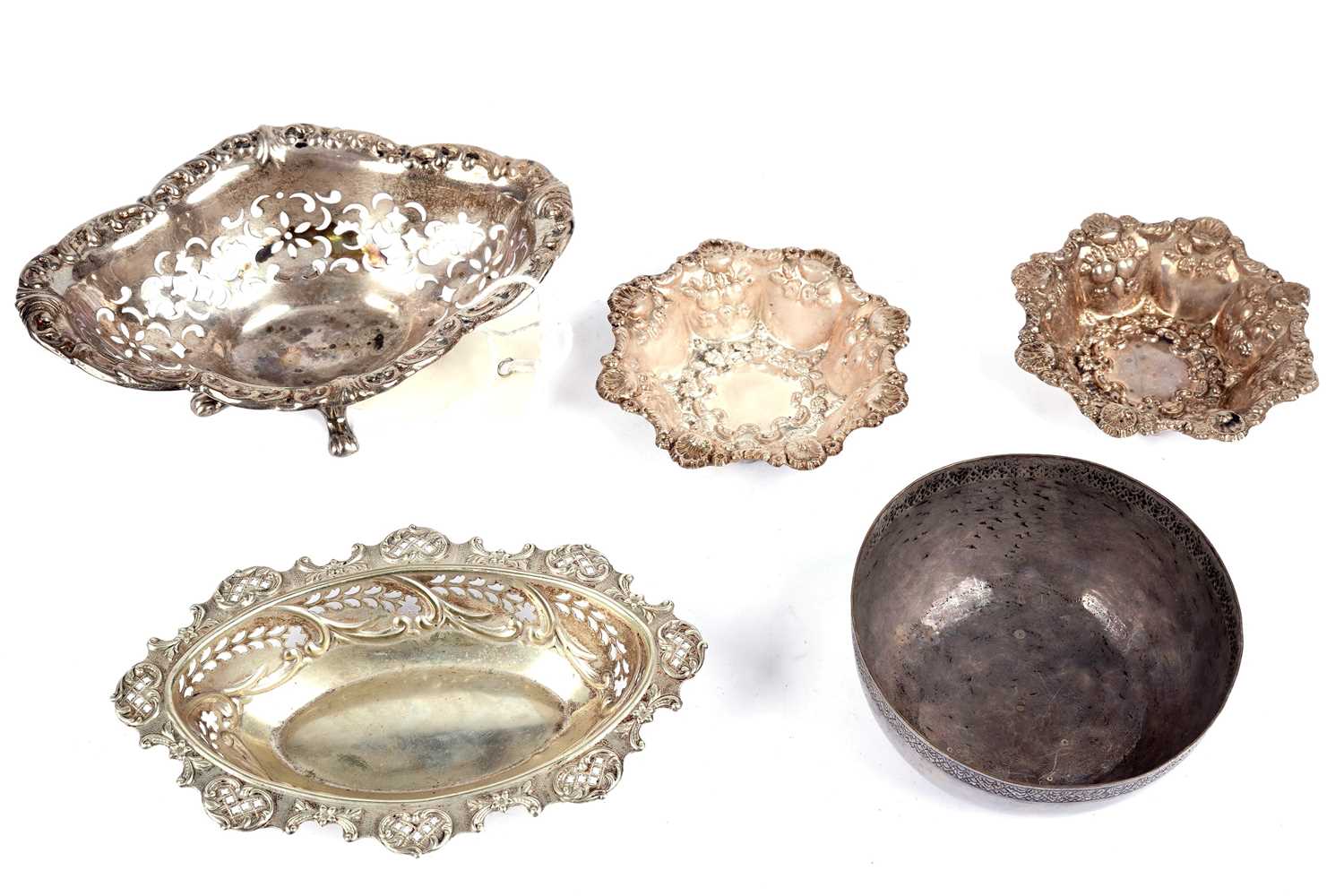 A selection of silver bonbon dishes and another