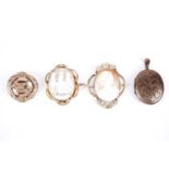 Victorian and later brooches and a locket, including a carved cameo depicting the Three Graces