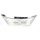 A silver twin handled boat shaped dish