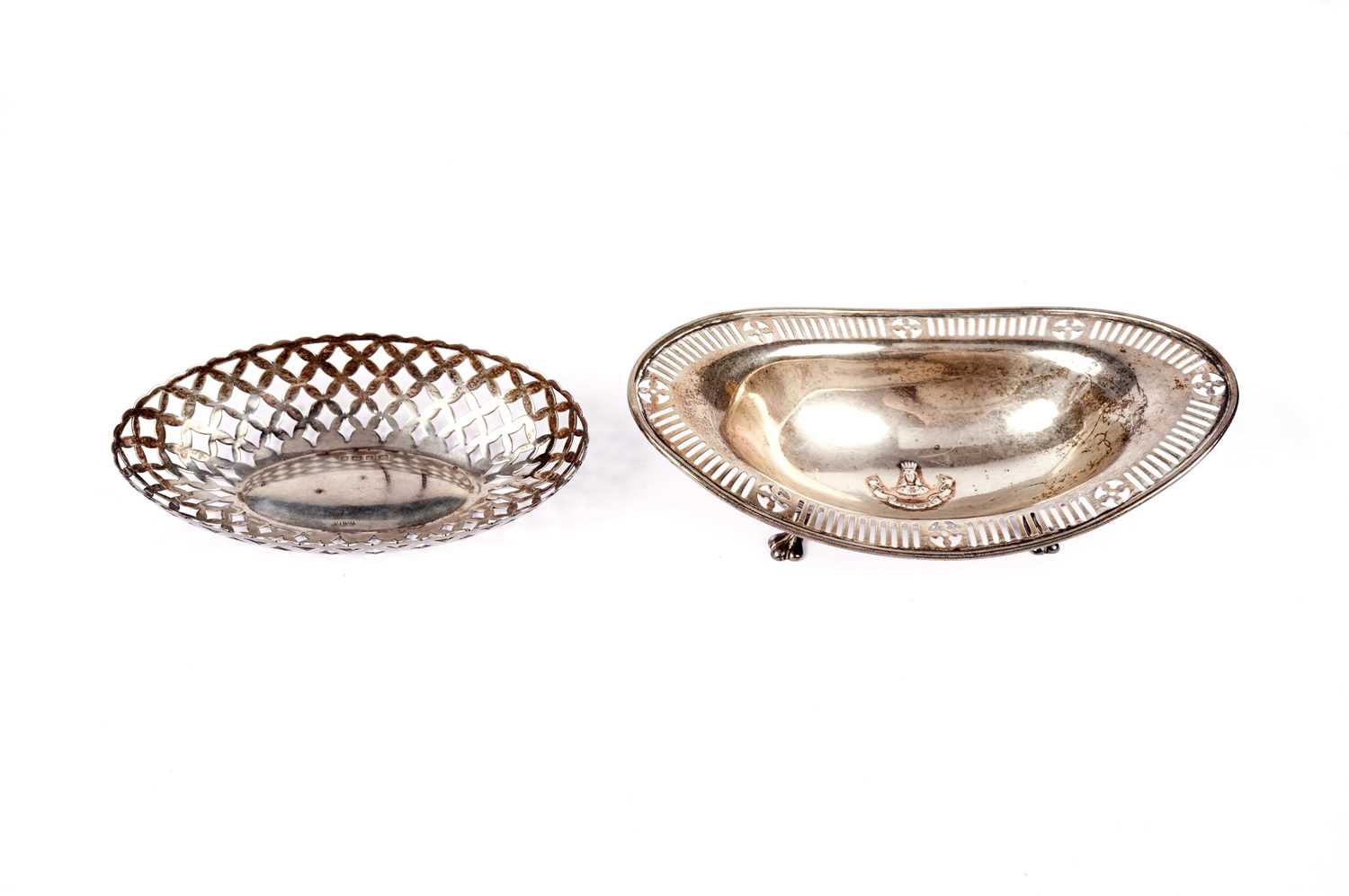 An Edwardian silver dish, by Carrington & Co; and another