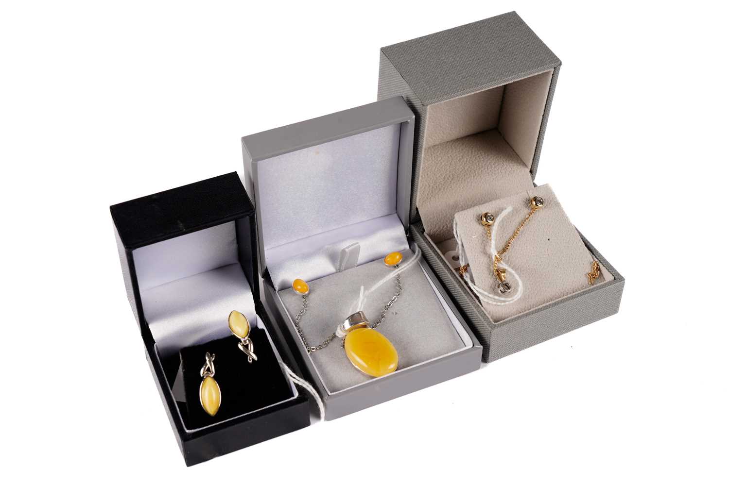 A diamond pendant and earrings; and other jewellery