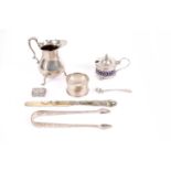 A selection of silver condiments and other items