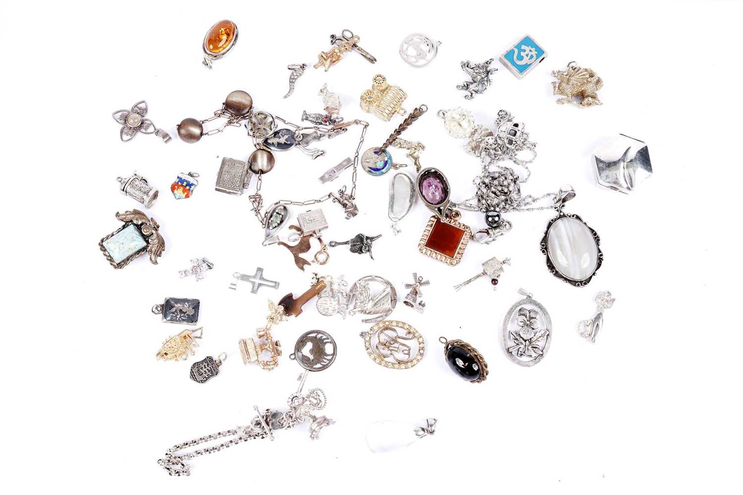 A selection of silver and other charms