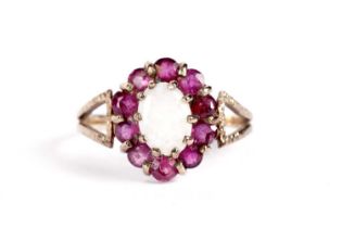 An opal and ruby cluster ring