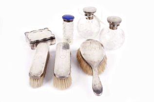 A selection of silver dressing table accessories