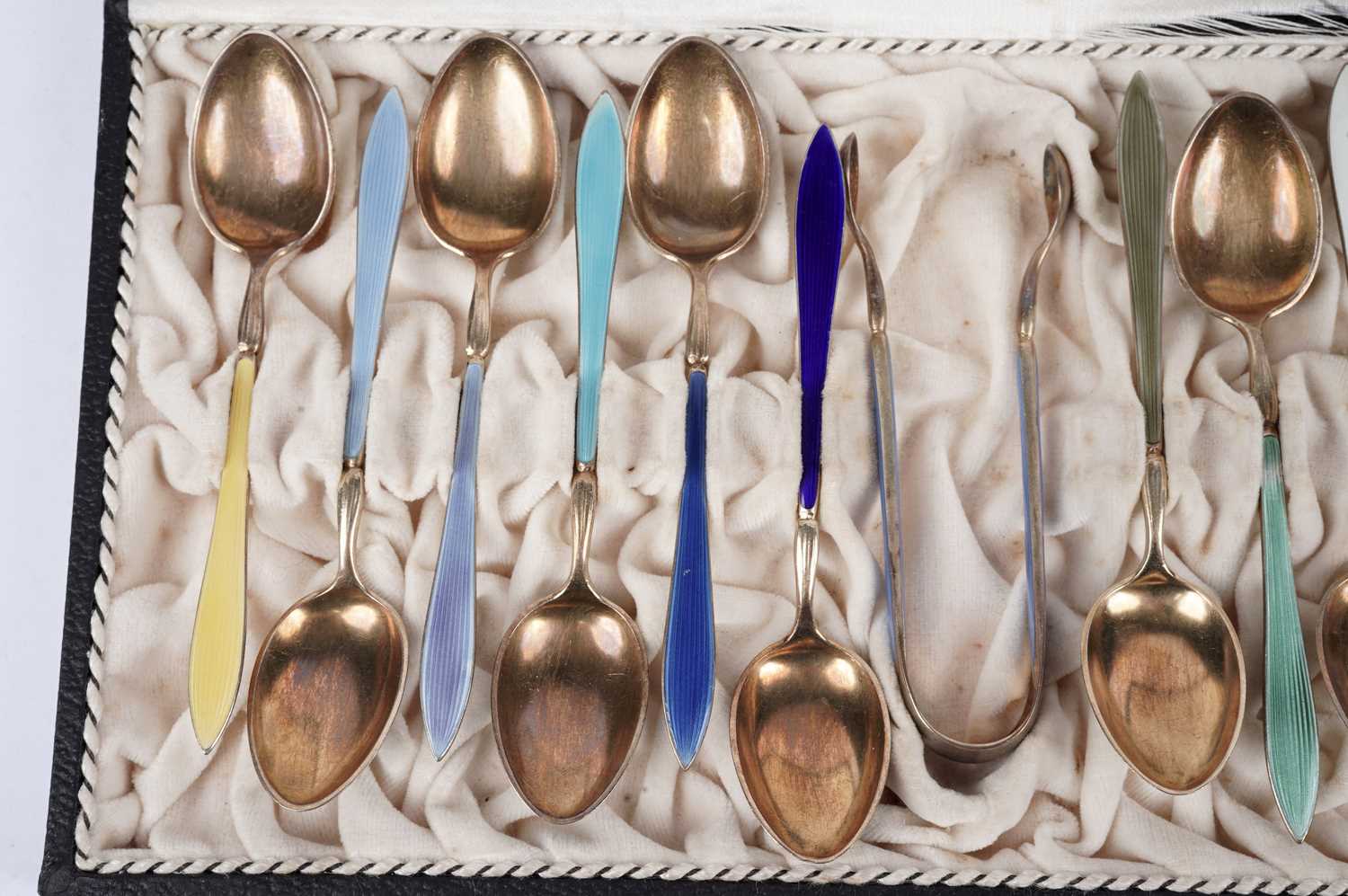 A set of Norwegian enamelled silver gilt coffee spoons and sugar tongs - Image 2 of 5