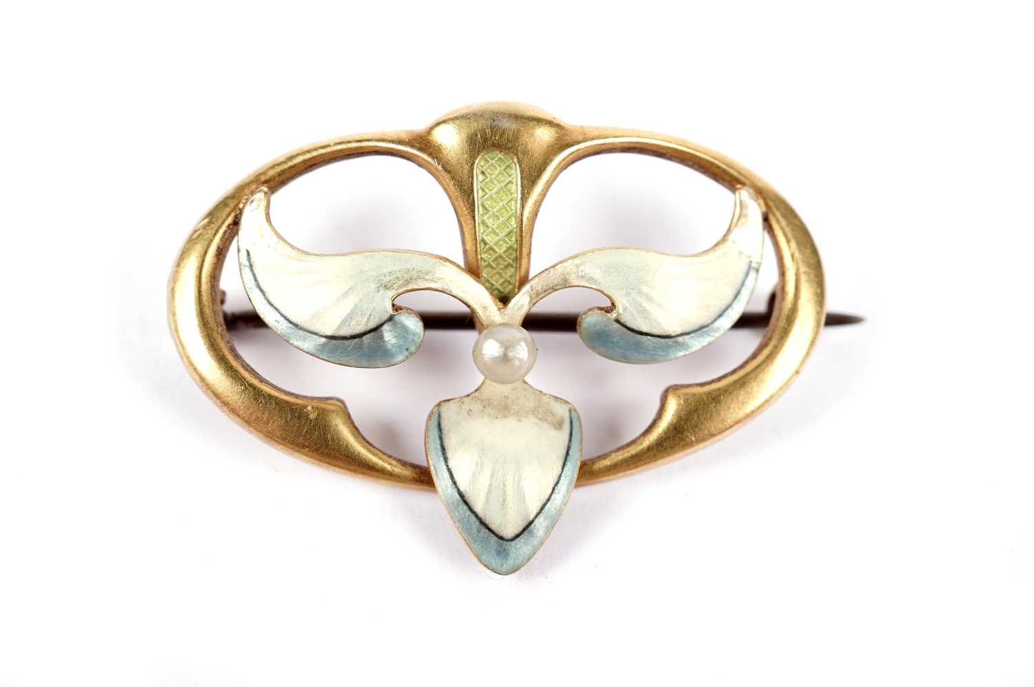 An Art Nouveau seed pearl and enamel yellow gold brooch