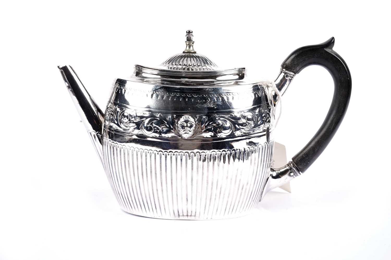 A Victorian silver tea pot