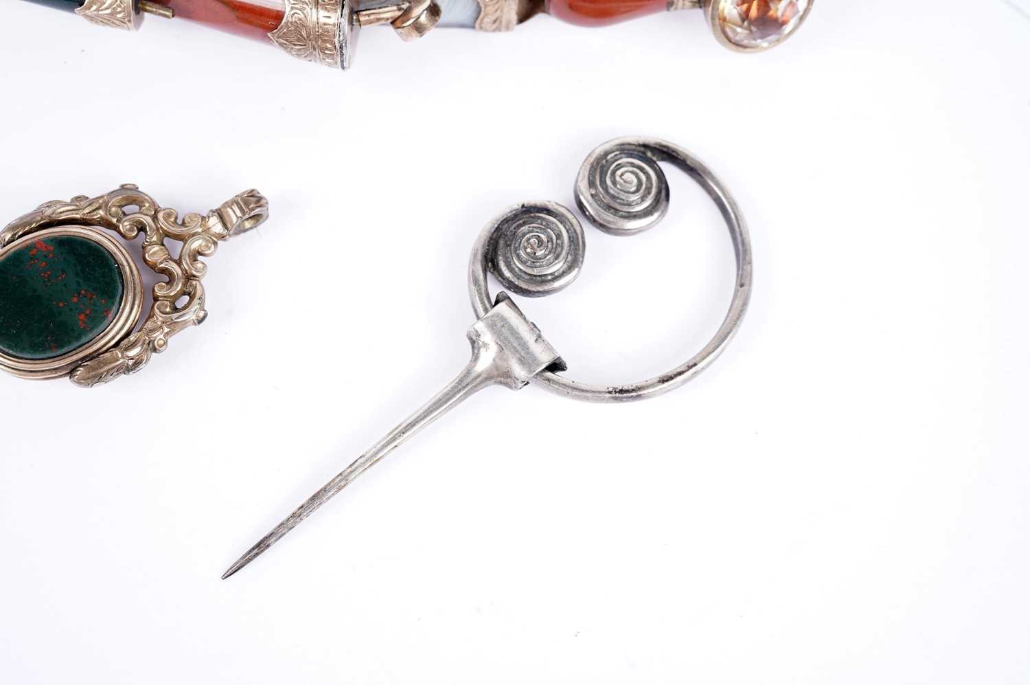 A Victorian plaid brooch; an Iona silver brooch by Alexander Ritchie; and a swivel fob - Image 3 of 6