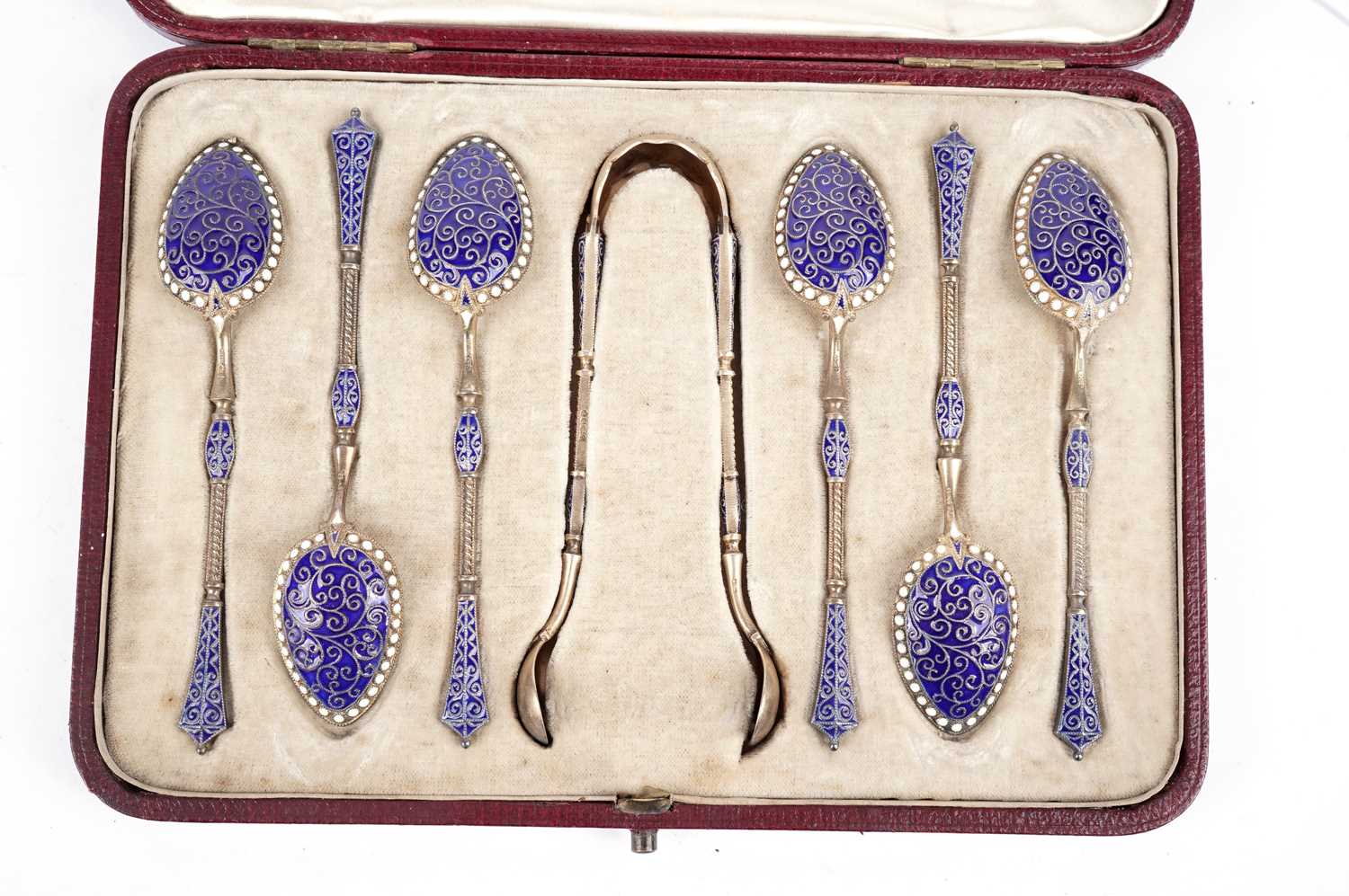 A set of six Norwegian silver and blue and white enamel coffee spoons