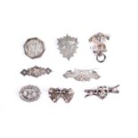 Late Victorian sentimental silver and white metal brooches