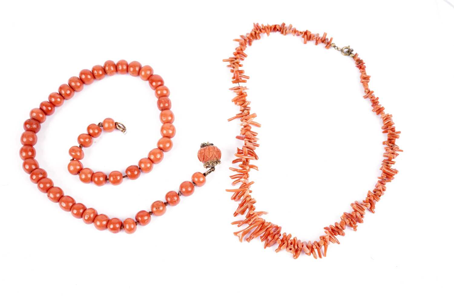 A coral bead necklace; and a branch coral necklace