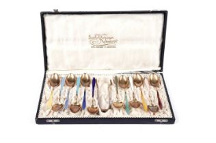 A set of Norwegian enamelled silver gilt coffee spoons and sugar tongs