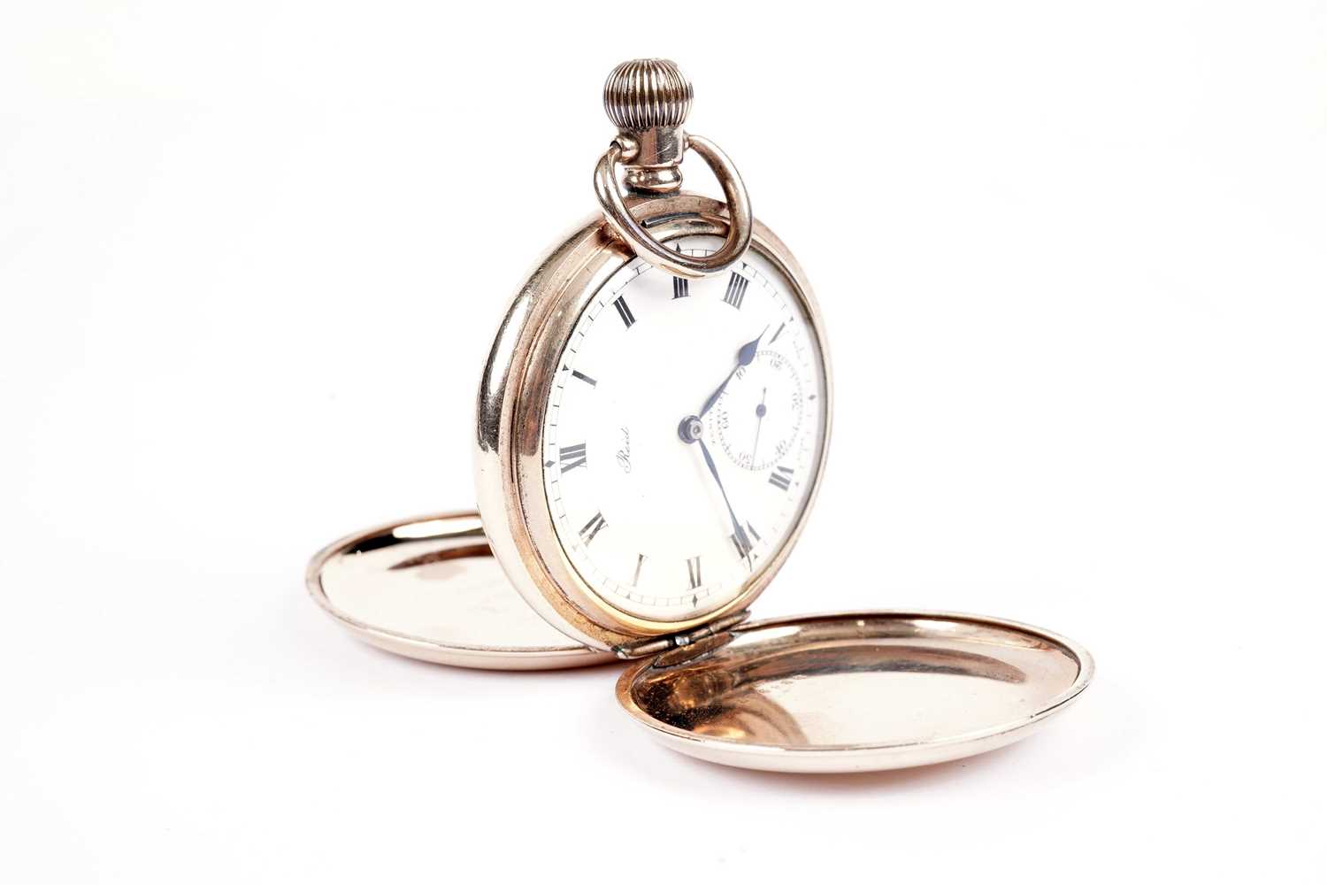 An antique gold-plated Zenith hunter pocket watch retailed by Reid & Sons