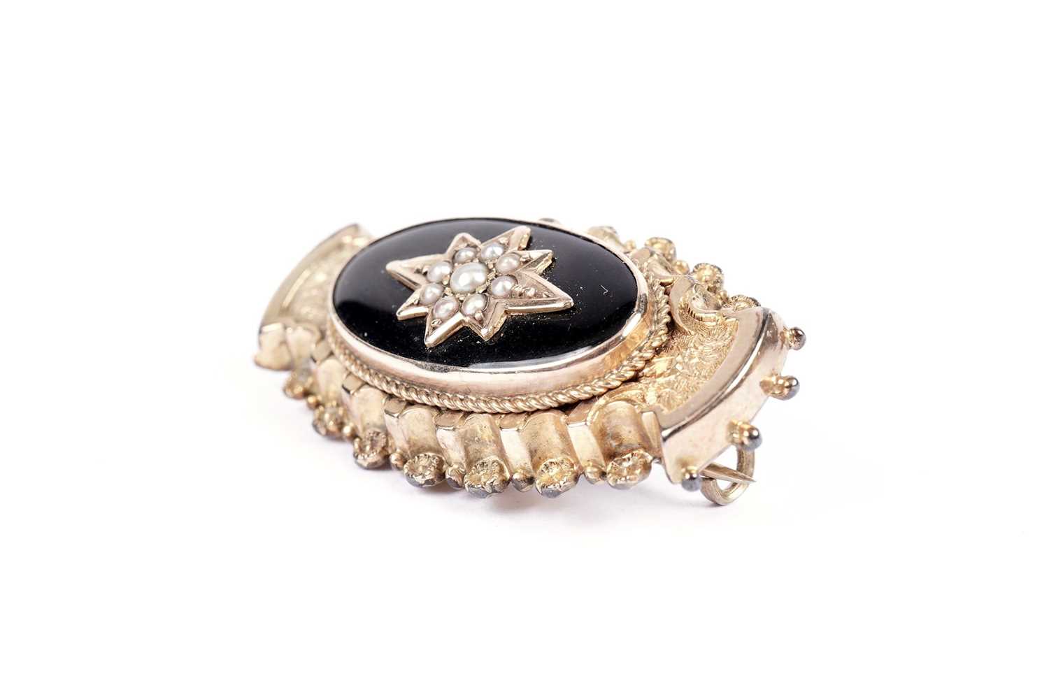 A Victorian seed pearl, black enamel and gilt metal mourning brooch - Image 2 of 3