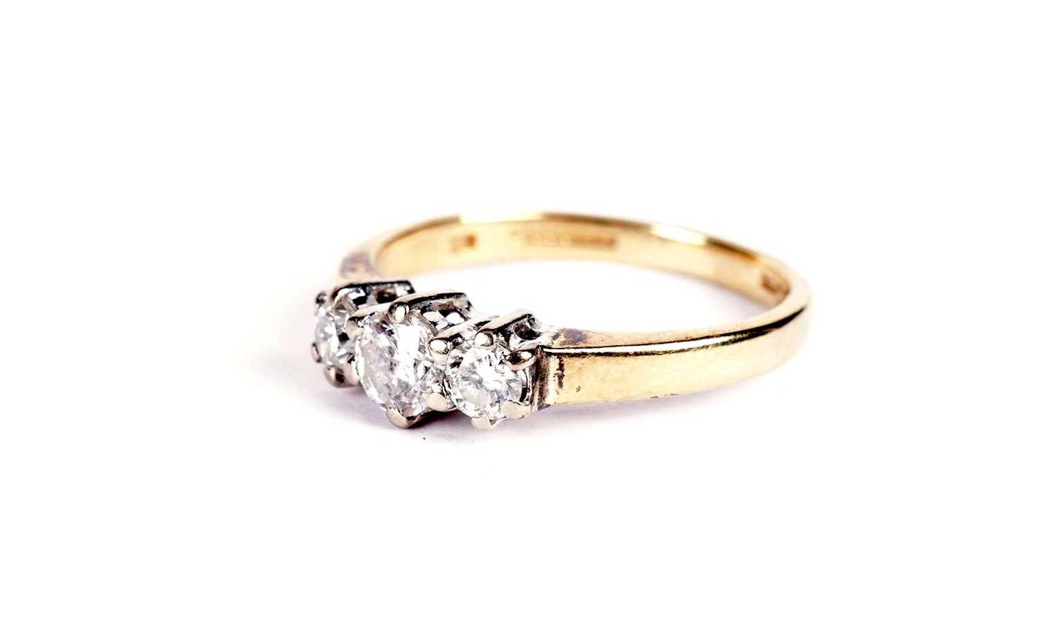 A three stone diamond ring