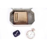 The Consol gold plated open face pocket watch; and a powder compact