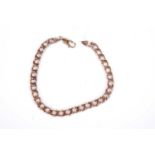 A rose gold curb link chain bracelet