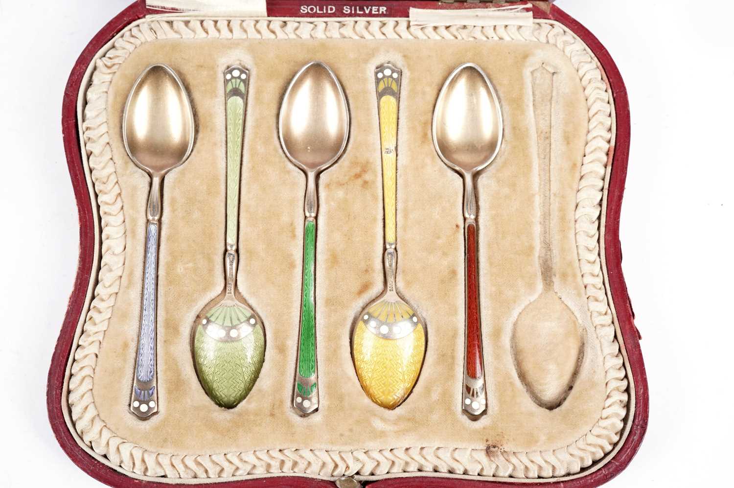 Five Norwegian silver gilt and enamel coffee spoons