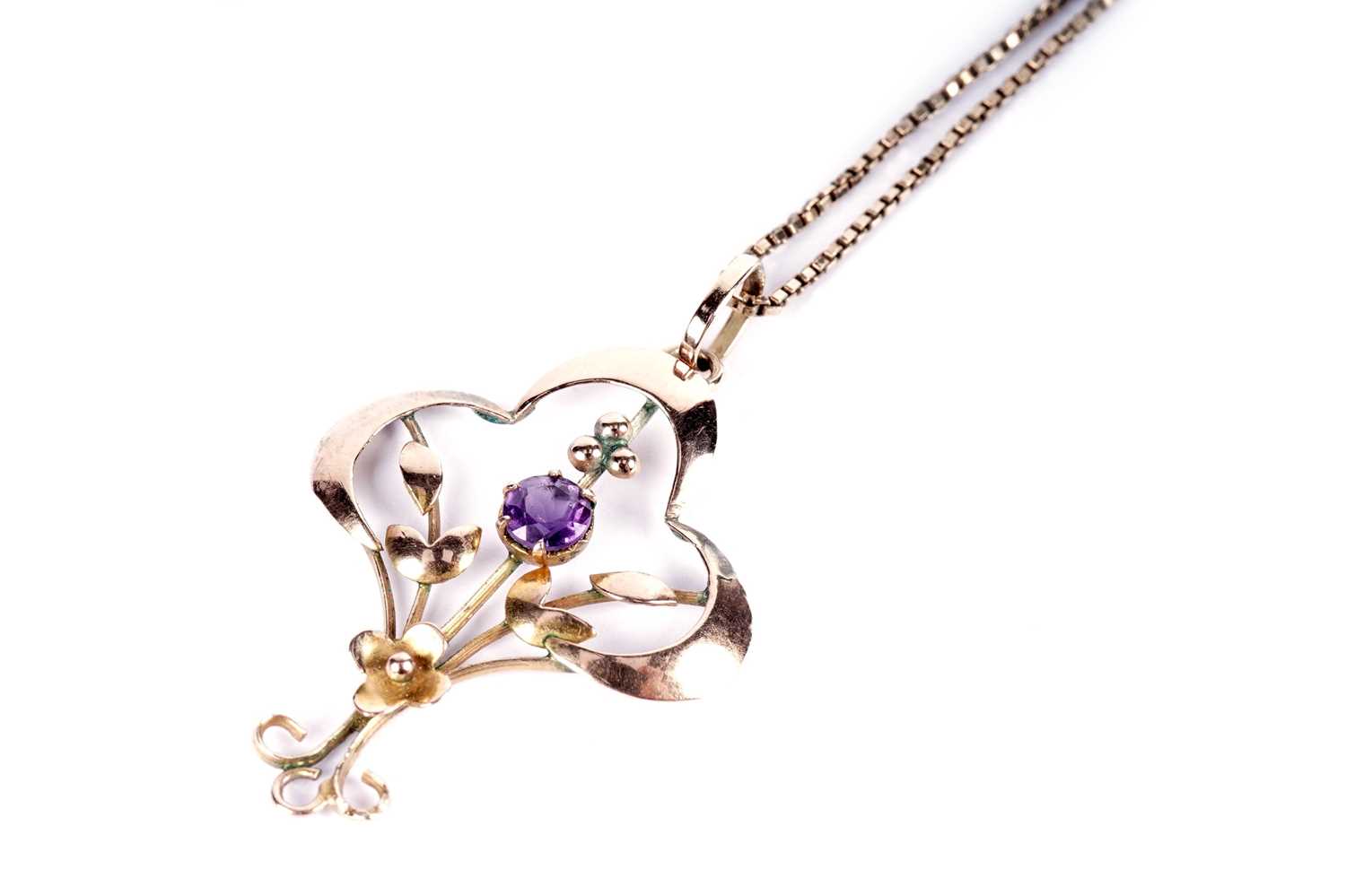 An Edwardian amethyst openwork pendant necklace