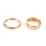 Two 22ct yellow gold wedding bands,