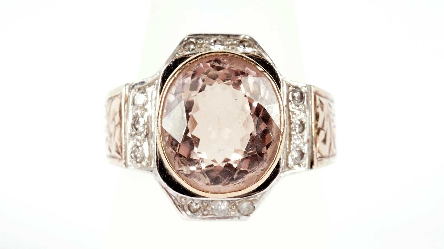 A pink-topaz and diamond dress ring
