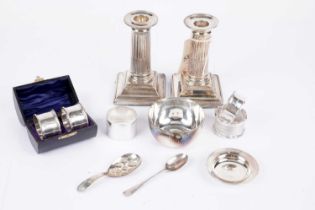 A selection of Elizabeth II silver including a cased pair of napkin rings and Armada dish