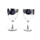 A pair of George IV silver chalices