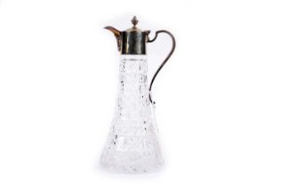 A silver mounted glass claret jug