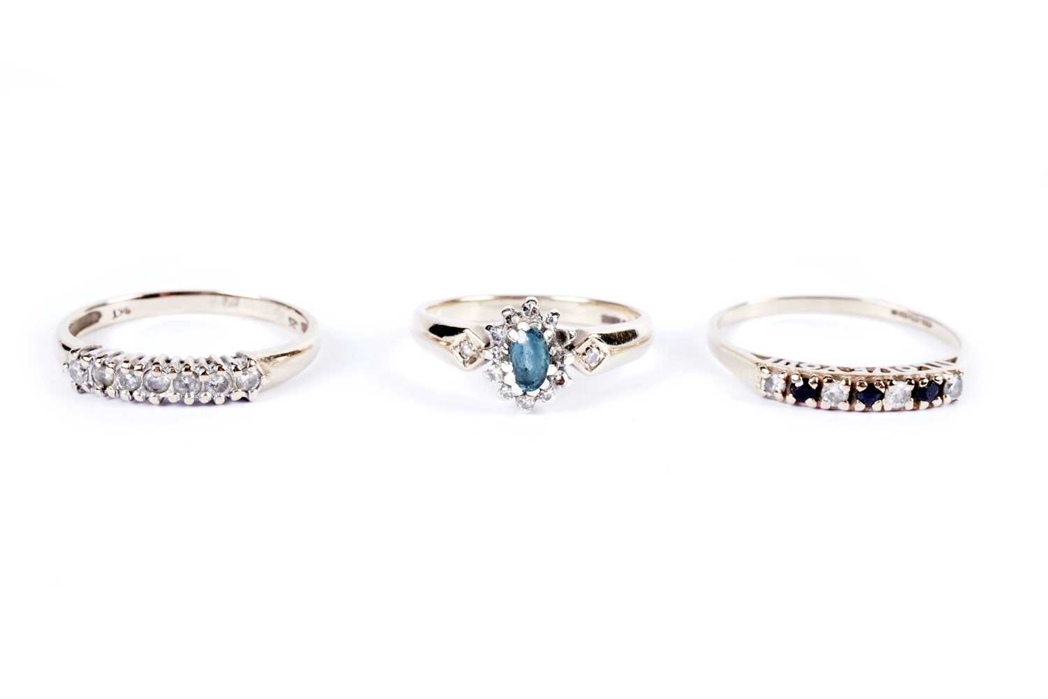 A diamond seven stone ring; and two other gold rings - Image 2 of 4